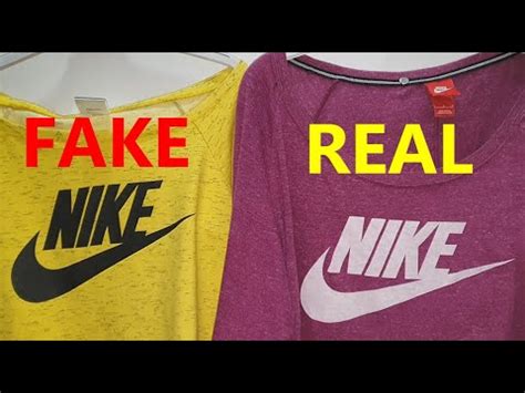 fake gildan shirt with the nike sign|counterfeit nike shirts.